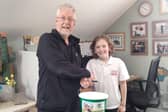 Helping Harrogate disabled charity - Western Primary School pupil Daniel Jackson  presenting the funds to Open Country Chief Officer David Shaftoe. (Picture contributed)