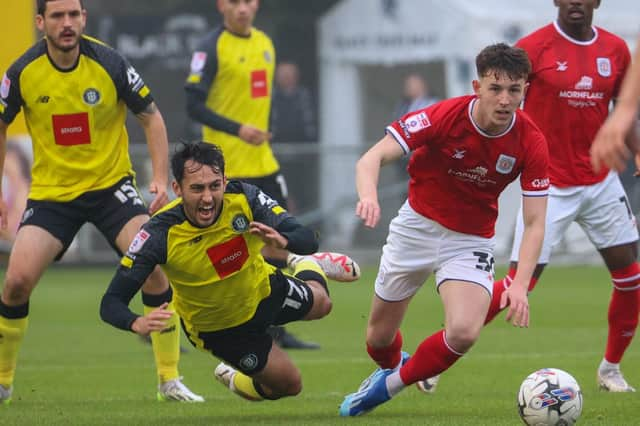 Levi Sutton hits the deck during Harrogate Town's 1-0 home defeat to Crewe Alexandra. Pictures: Matt Kirkham