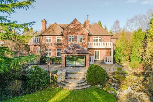 This five bedroom and four bathroom detached house is for sale with Strutt and Parker for £3,400,000