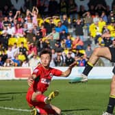 Levi Sutton fires home Harrogate Town's last-gasp equaliser during Good Friday's 2-2 draw with AFC Wimbledon. Pictures: Matt Kirkham