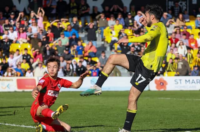 Levi Sutton fires home Harrogate Town's last-gasp equaliser during Good Friday's 2-2 draw with AFC Wimbledon. Pictures: Matt Kirkham