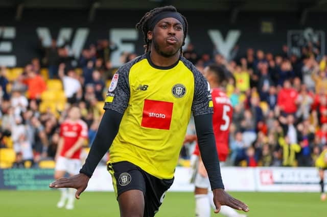 Harrogate Town winger Abraham Odoh celebrates his 80th-minute winner against Salford City. Pictures: Matt Kirkham