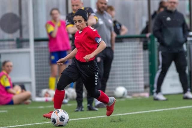 Better times - Harrogate College student Sabreyah Nowrozi in action as captain of the Afghanistan football team before the Taliban took hold.