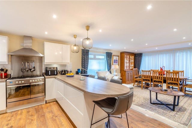 The open plan kitchen with diner.