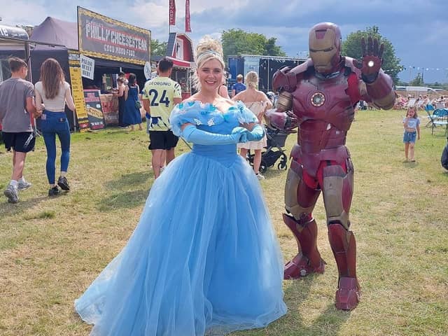 Cinderella and Ironman at the food and drink festival in Harrogate.