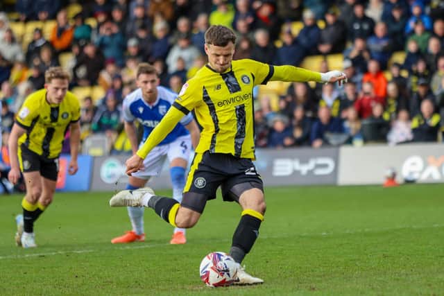 Josh March handed Harrogate Town a 40th-minute lead against the Gills when he converted from the penalty spot.
