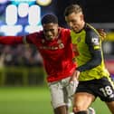 Jack Muldoon in action during Harrogate Town's 2-2 draw against Wrexham on Tuesday evening. Pictures: Matt Kirkham