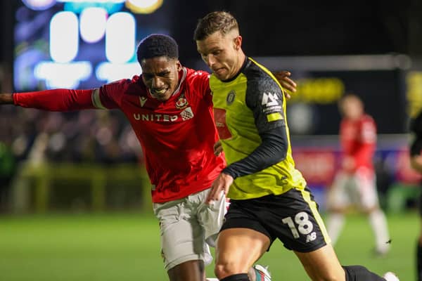 Jack Muldoon in action during Harrogate Town's 2-2 draw against Wrexham on Tuesday evening. Pictures: Matt Kirkham