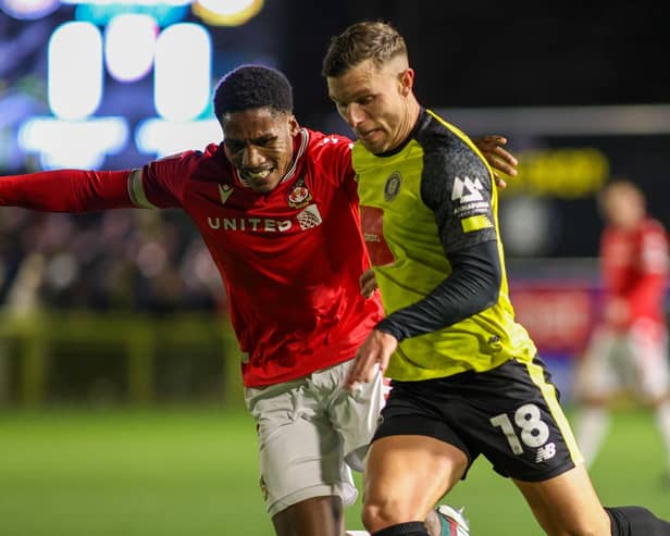 Jack Muldoon in action during Harrogate Town's 2-2 draw against Wrexham on Tuesday evening. Pictures: Matt Kirkham