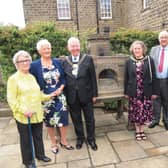 The Lord Mayor of Bradford visits Nidderdale Museum to unveil a 110 -year-old model of Angram Reservoir.