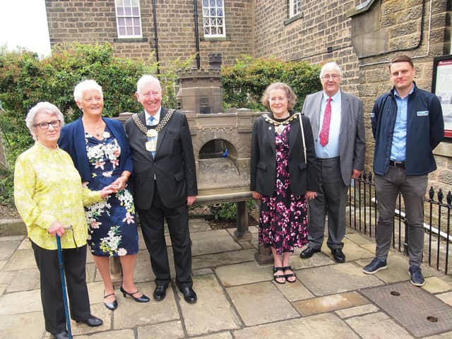 The Lord Mayor of Bradford visits Nidderdale Museum to unveil a 110 -year-old model of Angram Reservoir.