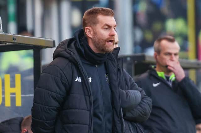 Harrogate Town manager Simon Weaver watches on from his technical area during Saturday's 3-1 home loss to Colchester United. Pictures: Matt Kirkham