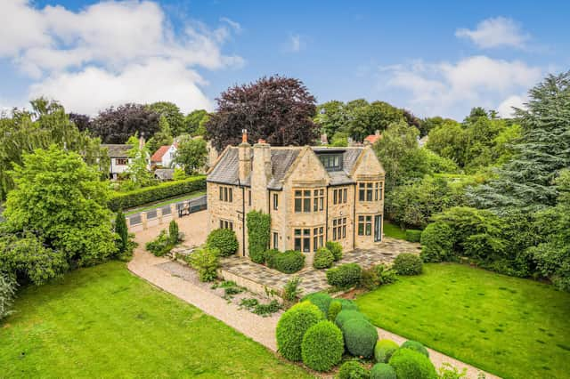 The impressive property in its grounds within the village of Linton.