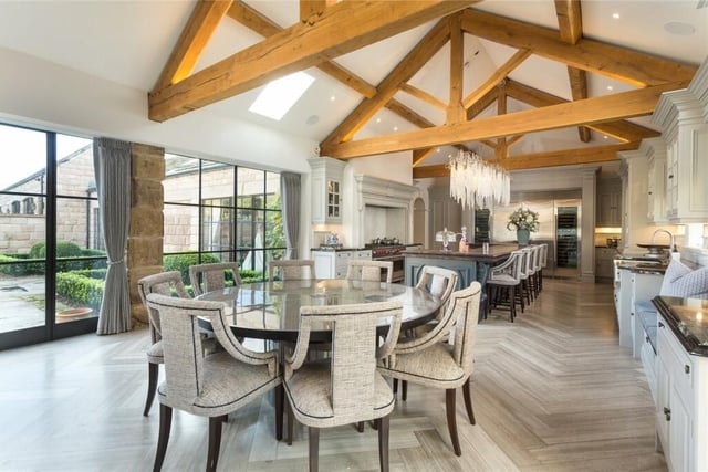 The dining area open plan to the luxury kitchen.