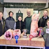 Pictured: Kendall's Farm Butchers with the young champion handlers and their prime homebred lambs.