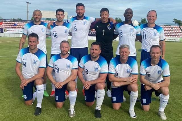 The England team, comprised largely of Harrogate Veterans FC players, that won the 2024 Seniors World Cup, line up before their opening group-stage match.