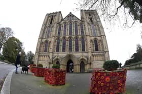 Poppies decorate planters outside Ripon Cathedral.