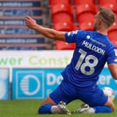 Jack Muldoon celebrates after netting from the penalty spot to hand Harrogate Town a 66th-minute lead at Doncaster Rovers. Pictures: Matt Kirkham