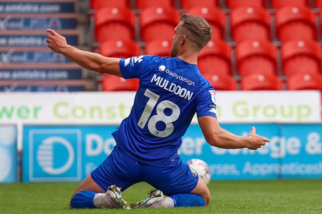 Jack Muldoon celebrates after netting from the penalty spot to hand Harrogate Town a 66th-minute lead at Doncaster Rovers. Pictures: Matt Kirkham