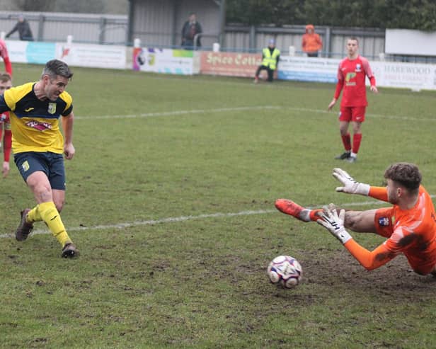Jimmy Knowles slots home the only goal of the game to hand Tadcaster Albion victory against Rossington Main. Picture: Keith Handley