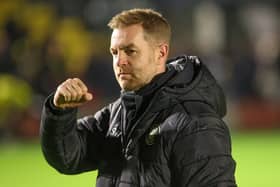 Simon Weaver and his Harrogate Town players travel to Northampton on Saturday knowing that a victory will all-but guarantee they will be playing League Two football once again next season. Picture: Matt Kirkham