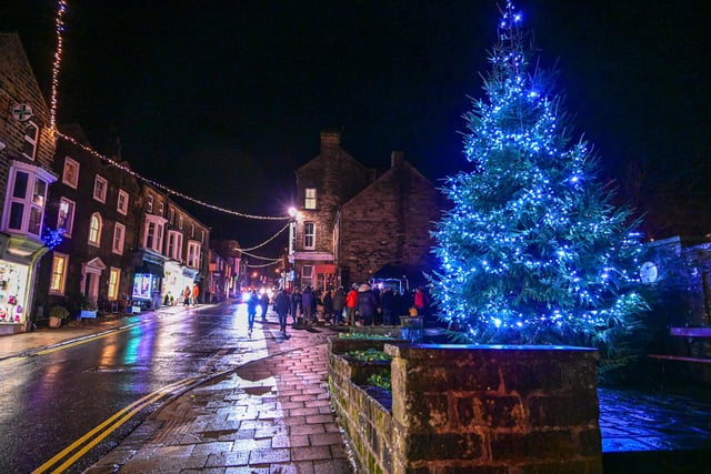 The town, known for its idyllic charm, did not disappoint as festive lights were hung around every corner.