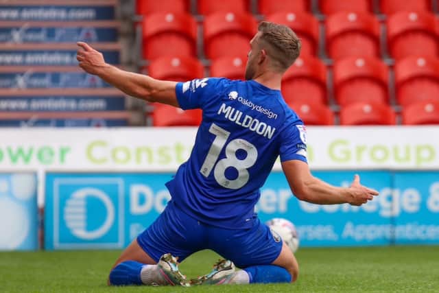 Jack Muldoon celebrates after netting a 66th-minute penalty against Doncaster Rovers.