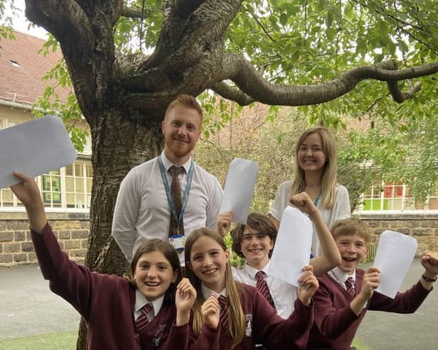 "The whole school was over the moon" - Alex Hope, headteacher of St John's C of E Primary School in Knaresborough with staff and pupils.  (Picture contributed)