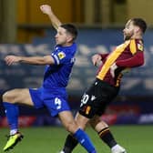Harrogate Town skipper Josh Falkingham in action during Thursday night's League Two defeat at Bradford City. Pictures: Matt Kirkham