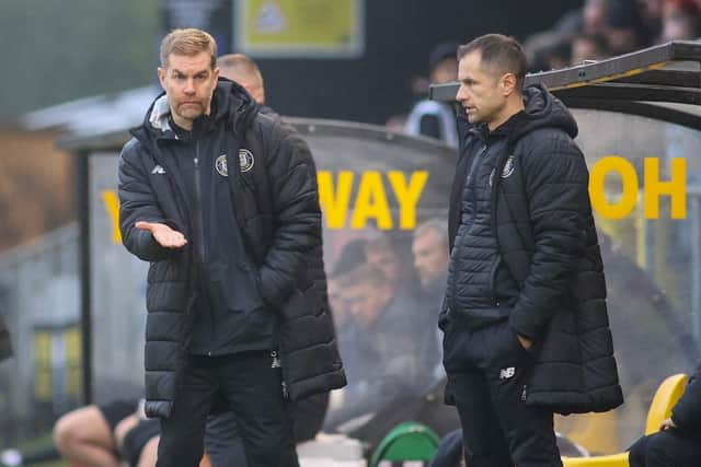 Sulphurites boss Simon Weaver, left, watches on at Wetherby Road.