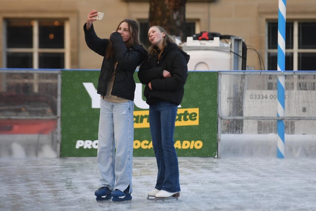Lucy Hammond and Lilly Barratt getting a selfie on the outdoor ice rink which can be found in the Crescent Gardens