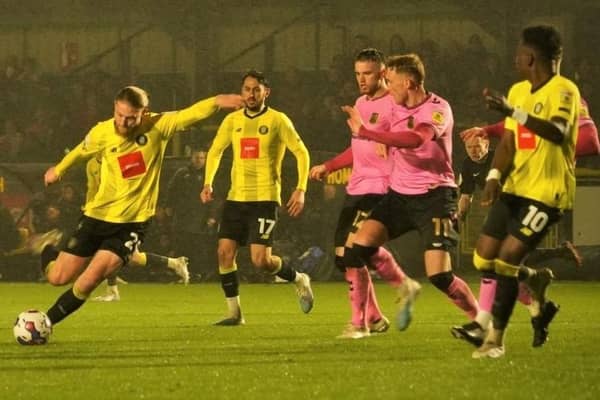 Luke Armstong scores Harrogate Town's equalising goal during Tuesday night's 1-1 draw with Northampton Town. Pictures: Matt Kirkham