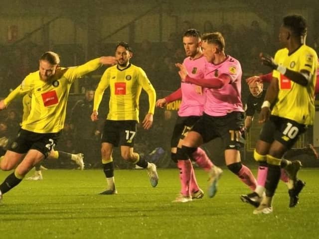 Luke Armstong scores Harrogate Town's equalising goal during Tuesday night's 1-1 draw with Northampton Town. Pictures: Matt Kirkham