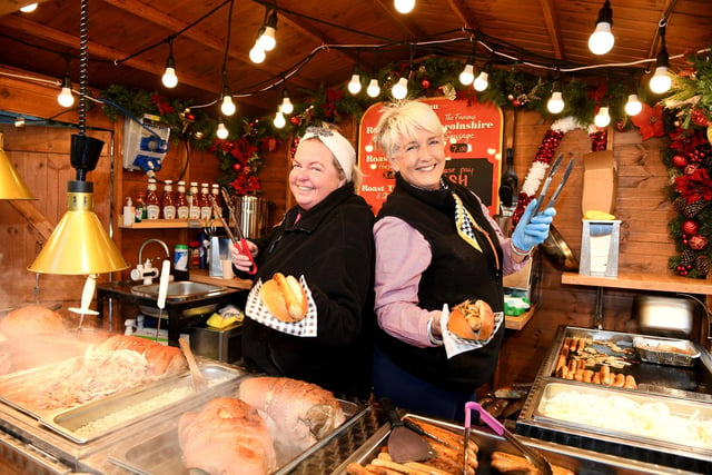 Elizabeth Walsh and Tracey Howard on the Carvery & Grill stall at the Christmas market on Cambridge Street