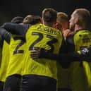 Harrogate Town celebrate after drawing level early in the second half of Tuesday evening's 2-2 home draw against Wrexham. Pictures: Matt Kirkham
