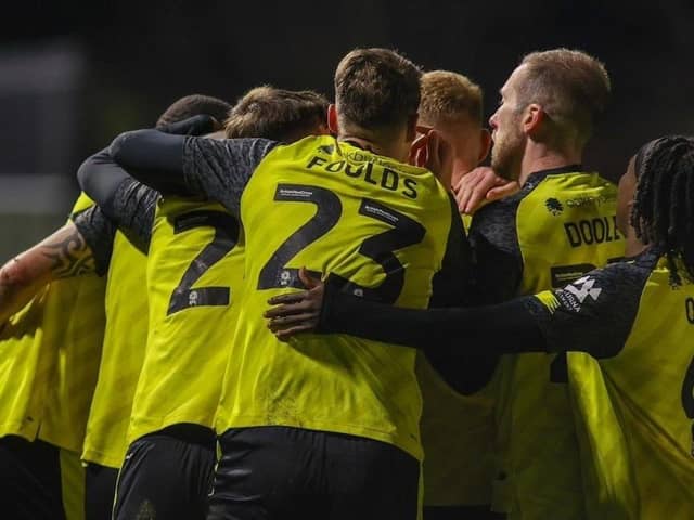 Harrogate Town celebrate after drawing level early in the second half of Tuesday evening's 2-2 home draw against Wrexham. Pictures: Matt Kirkham