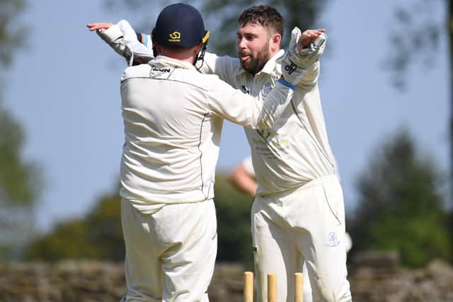 Billy MacGregor celebrates taking a wicket for Killinghall.