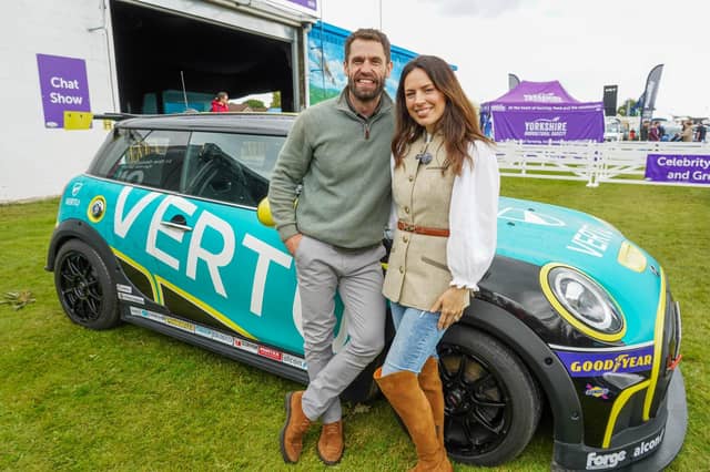 Liz and Kelvin Fletcher on the Vertu Stand