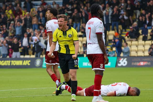 Will McGowan celebrates after firing Harrogate Town into a 2-1 lead against Tamworth at the Marcy Fitness Stadium. Picture: Matt Kirkham