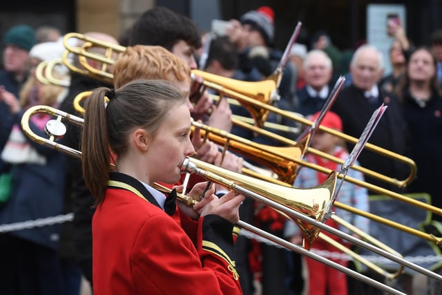 The Tewit Youth Band make their way through the town centre on their way to the cenotaph for the Remembrance Day service