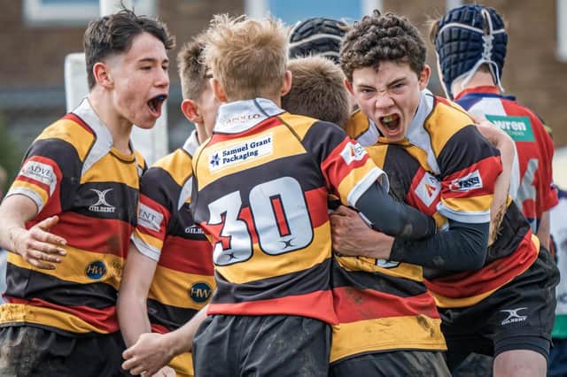 Members of Harrogate RUFC’s under-14s side celebrate their Yorkshire Cup final victory over Hull Ionians. Picture: Submitted