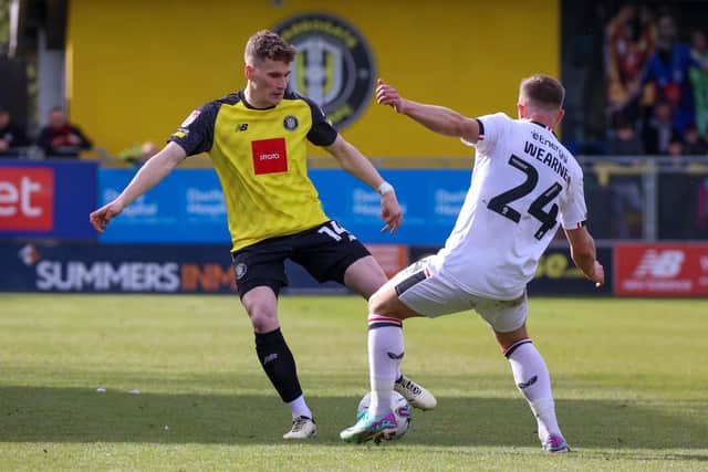 Toby Sims in action during Harrogate Town's 5-3 home loss to MK Dons. Picture: Matt Kirkham