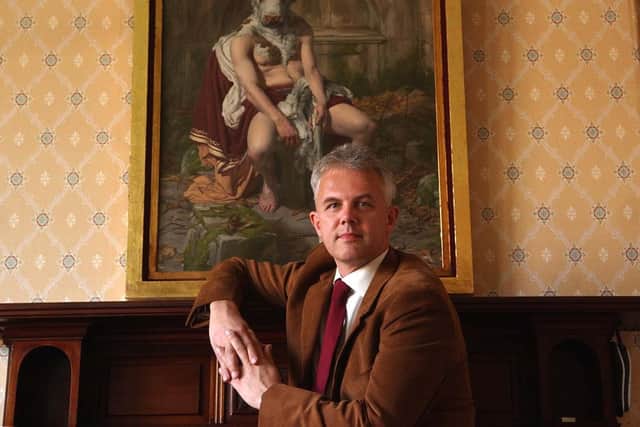 Late Harrogate art gallery owner Andrew Stewart of 108 Fine Art with "Minotaur", oil on canvas by Paul Reid. (Picture by Gerard Binks)