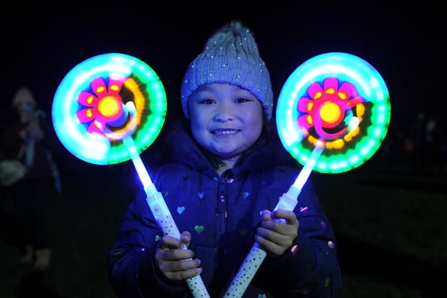 Janelle Amor (aged 7) enjoying the Harrogate Stray Bonfire with her glow stick spinners in 2019