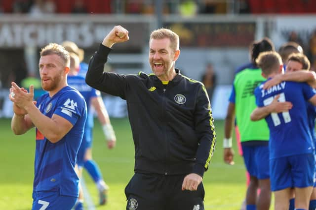 Sulphurites boss Simon Weaver celebrates after the full-time whistle.