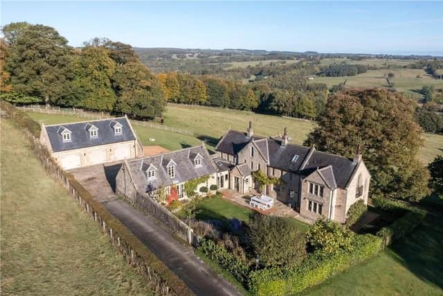 This five bedroom and three bathroom detached house is currently on the market with Carter Jonas for £1,950,000