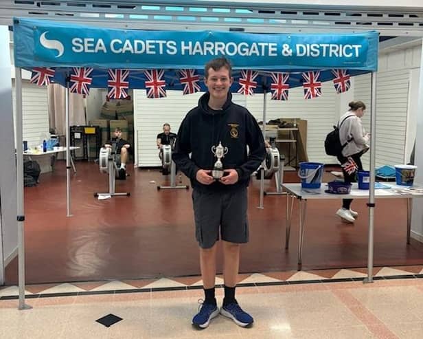 First Cadet Oscar with his sailing competition winners trophy
