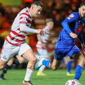 Harrogate Town midfielder Levi Sutton was one of the stand-out performers during Tuesday night's 2-0 success at Doncaster Rovers. Pictures: Matt Kirkham