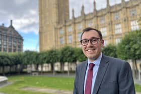 Tom Gordon MP stood outside the Houses of Parliament