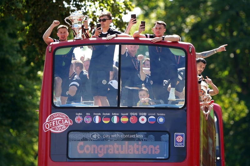 The players paraded on an open-top bus around Harrogate to celebrate the club's promotion to the English Football League